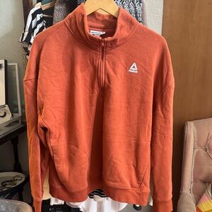 Reebok quarter zip in orange